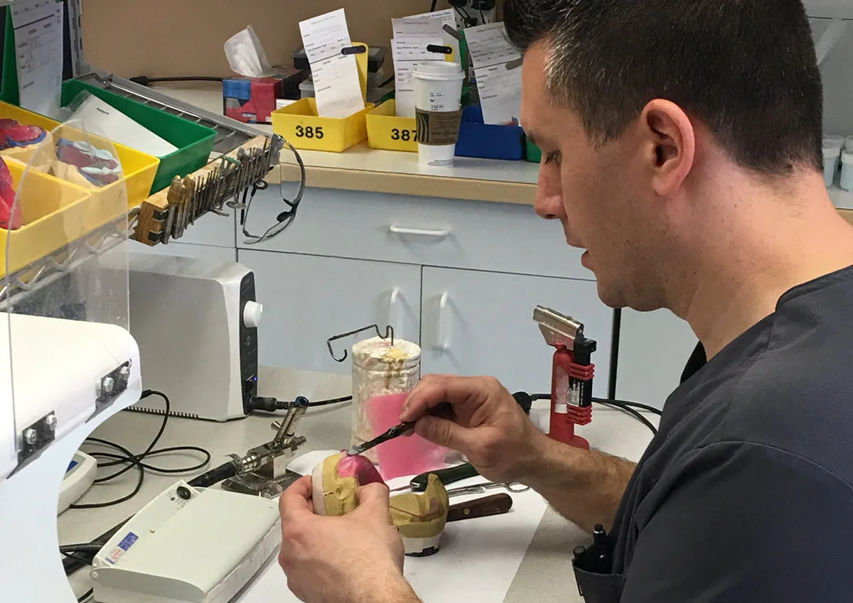 Calgary denturist Dan Mihajlov